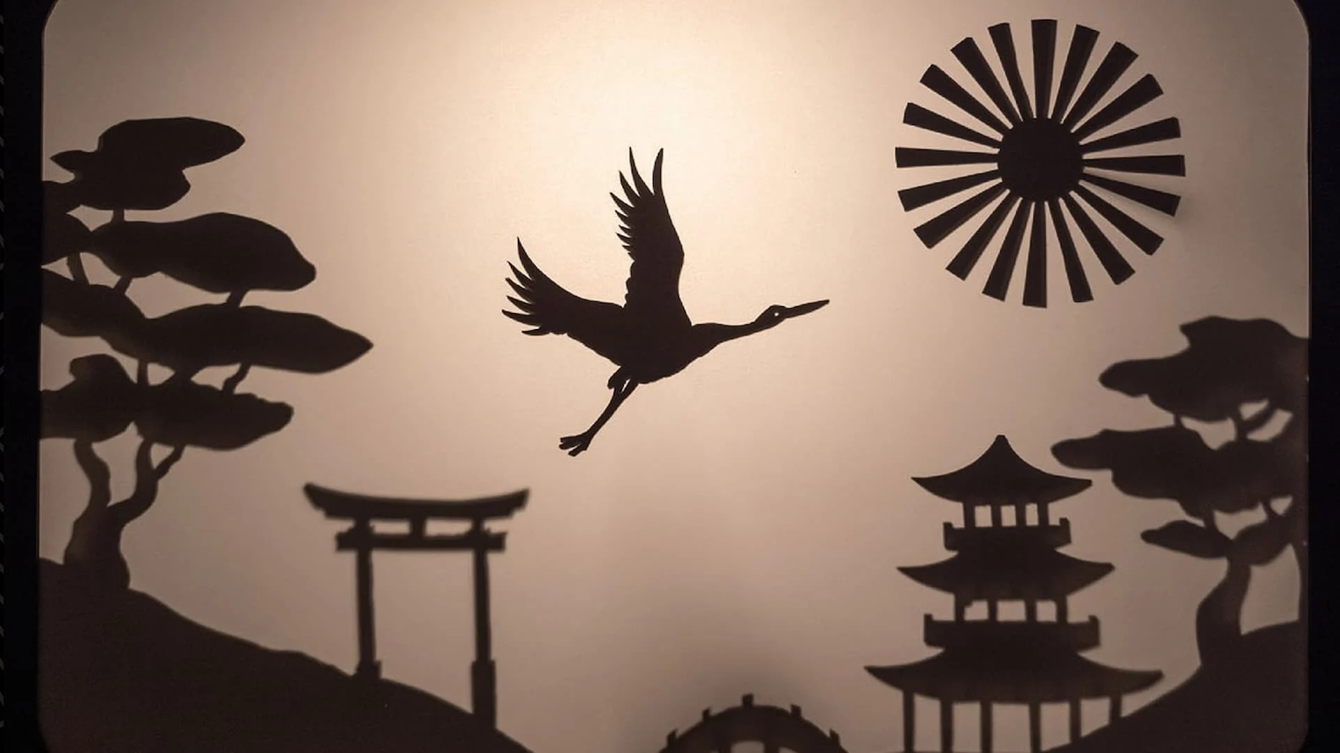 Pássaro em sombras chinesas
