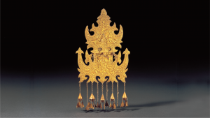 Objeto dourado da Casa Ásia